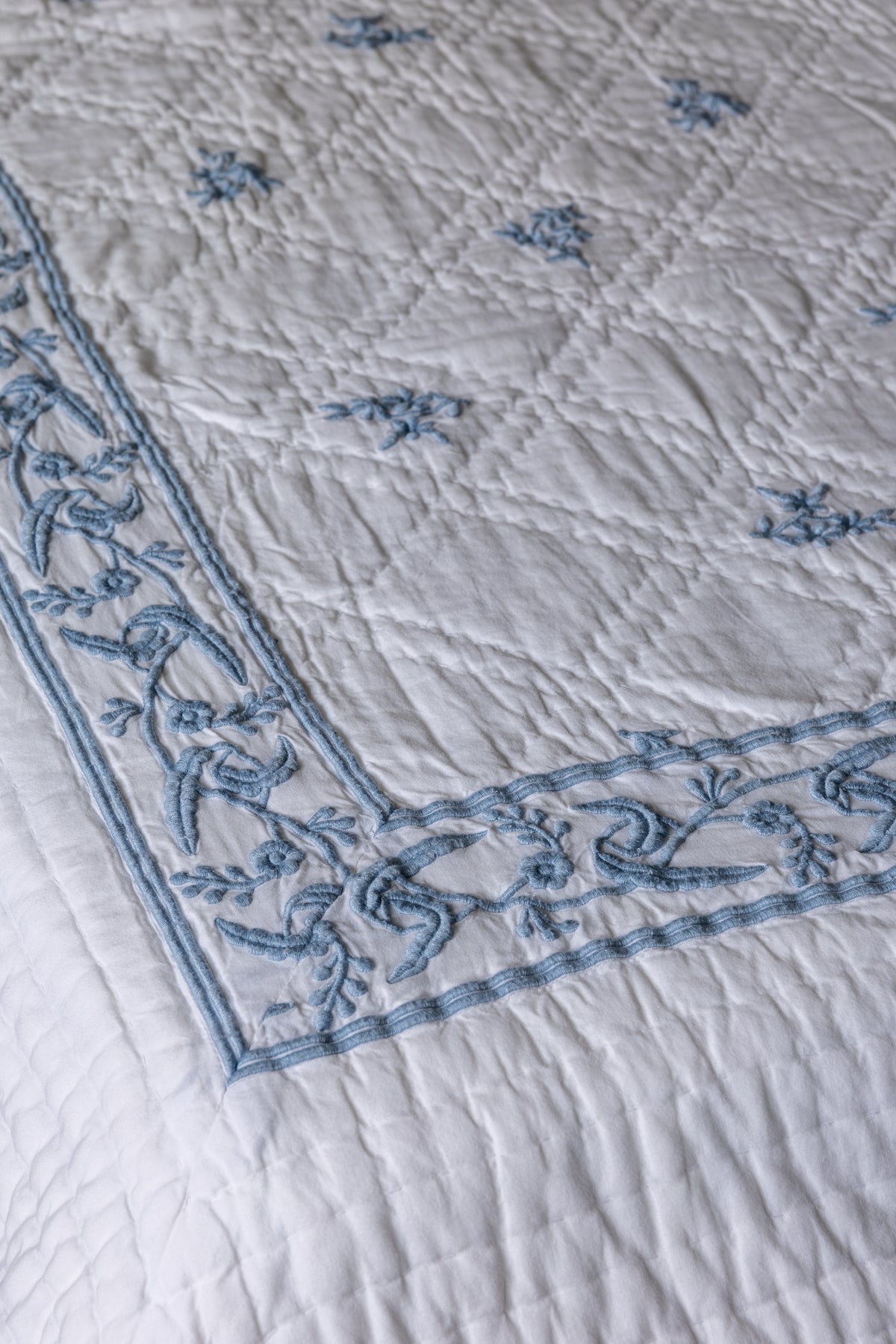 The Vine & Scroll Embossed Kantha Quilt with Shams